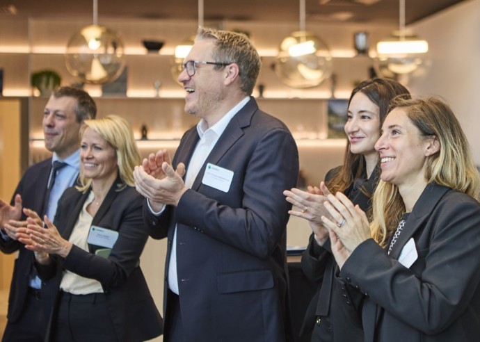 Luxembourg and Paris colleagues celebrating our Euronext Bell Ringing, a milestone in business achievement.