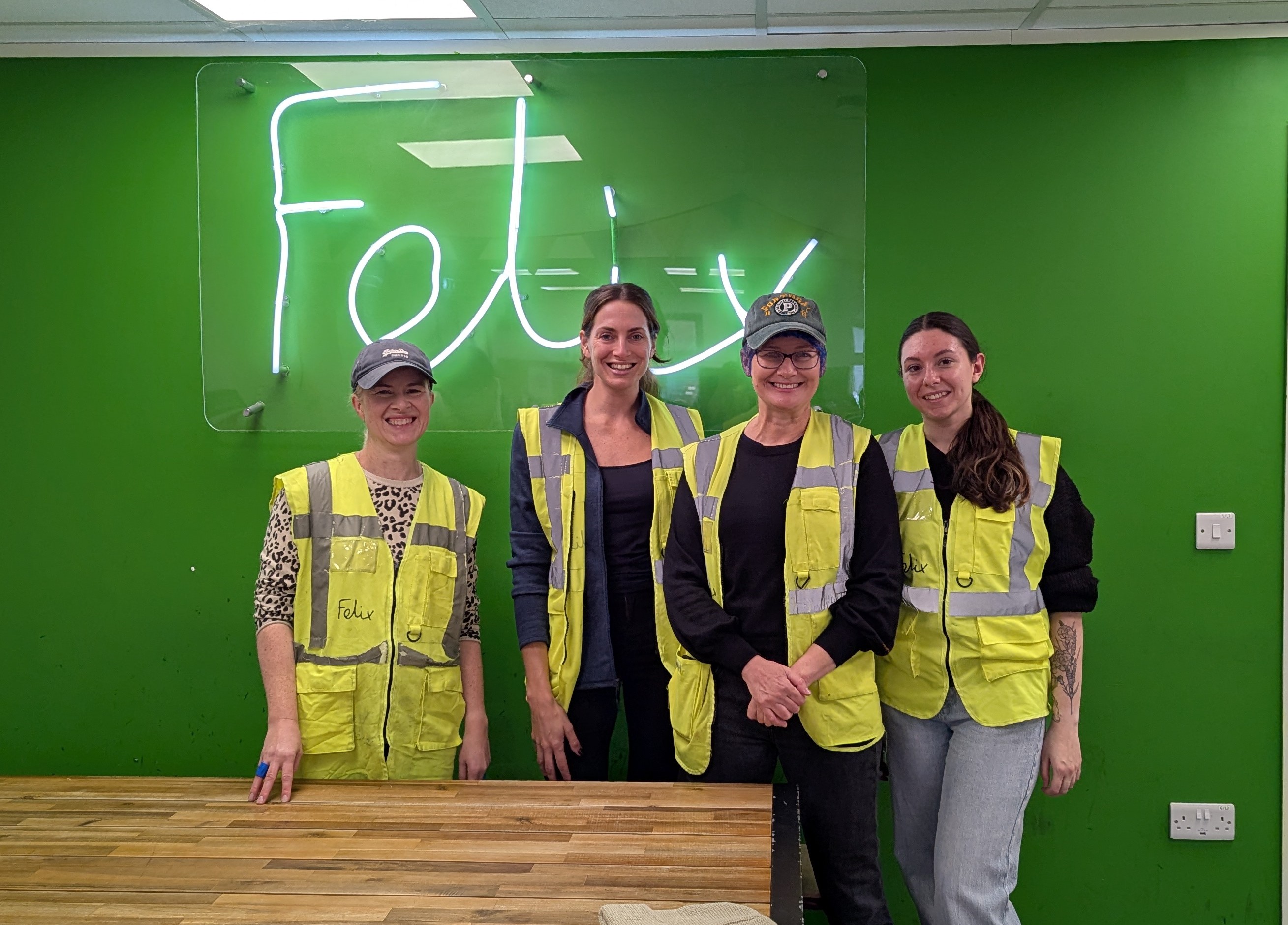 London colleagues volunteering at a local charity to turn surplus fresh food into meals for people in need.