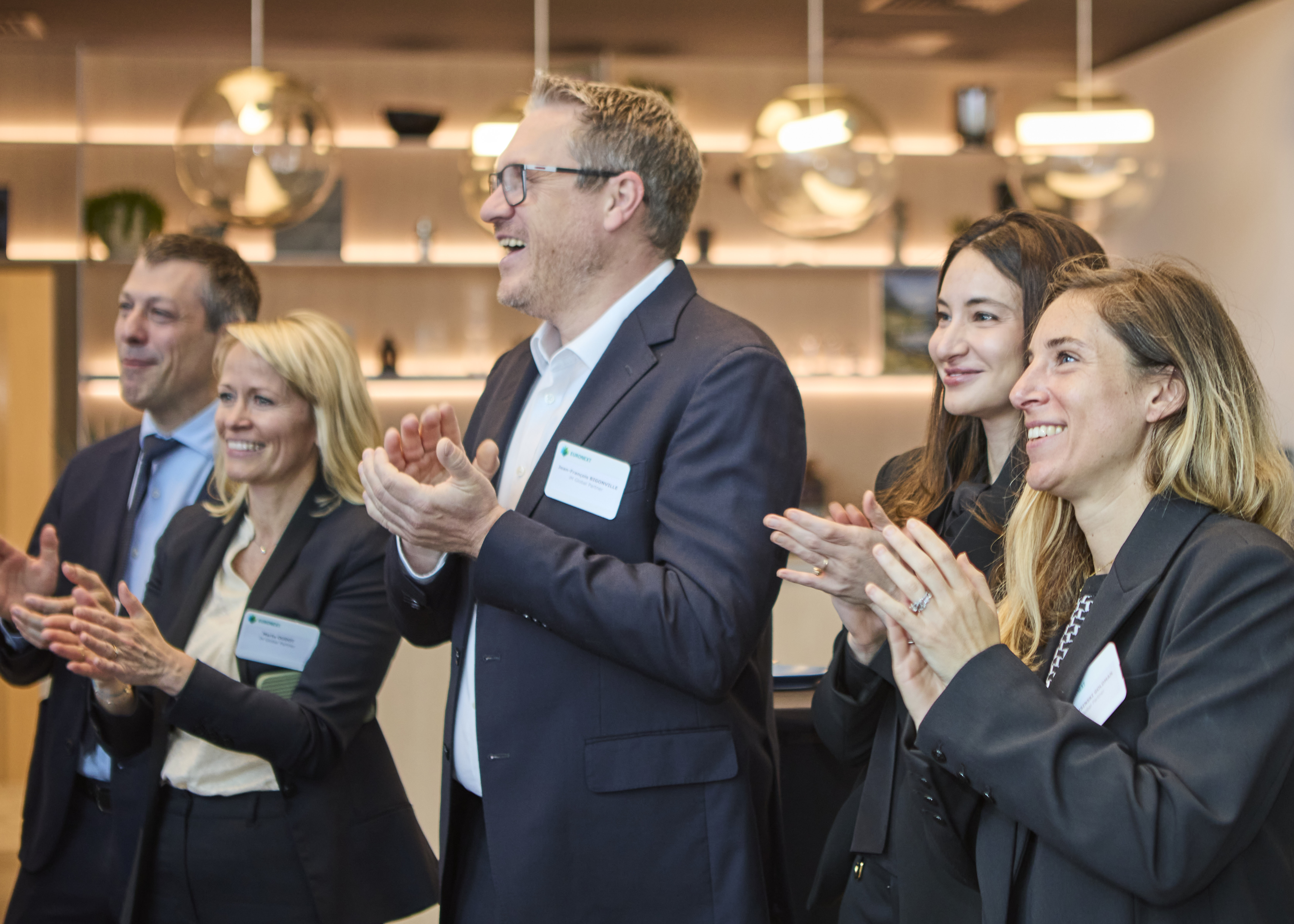 Luxembourg and Paris colleagues celebrating our Euronext Bell Ringing, a milestone in business achievement.