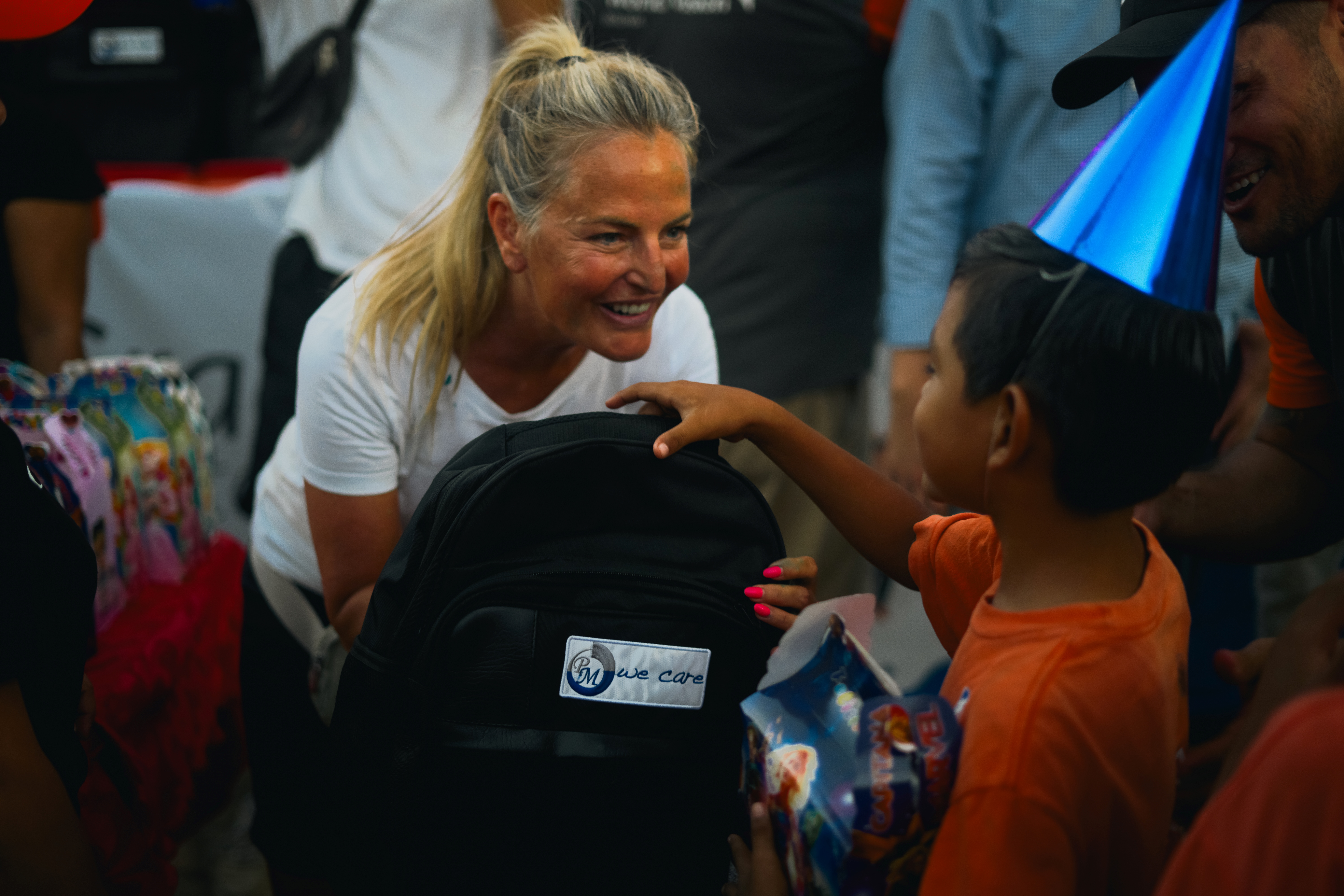PM-International’s Charity Ambassador, Vicki Sorg, volunteering at a birthday party for sponsored children in Bolivia