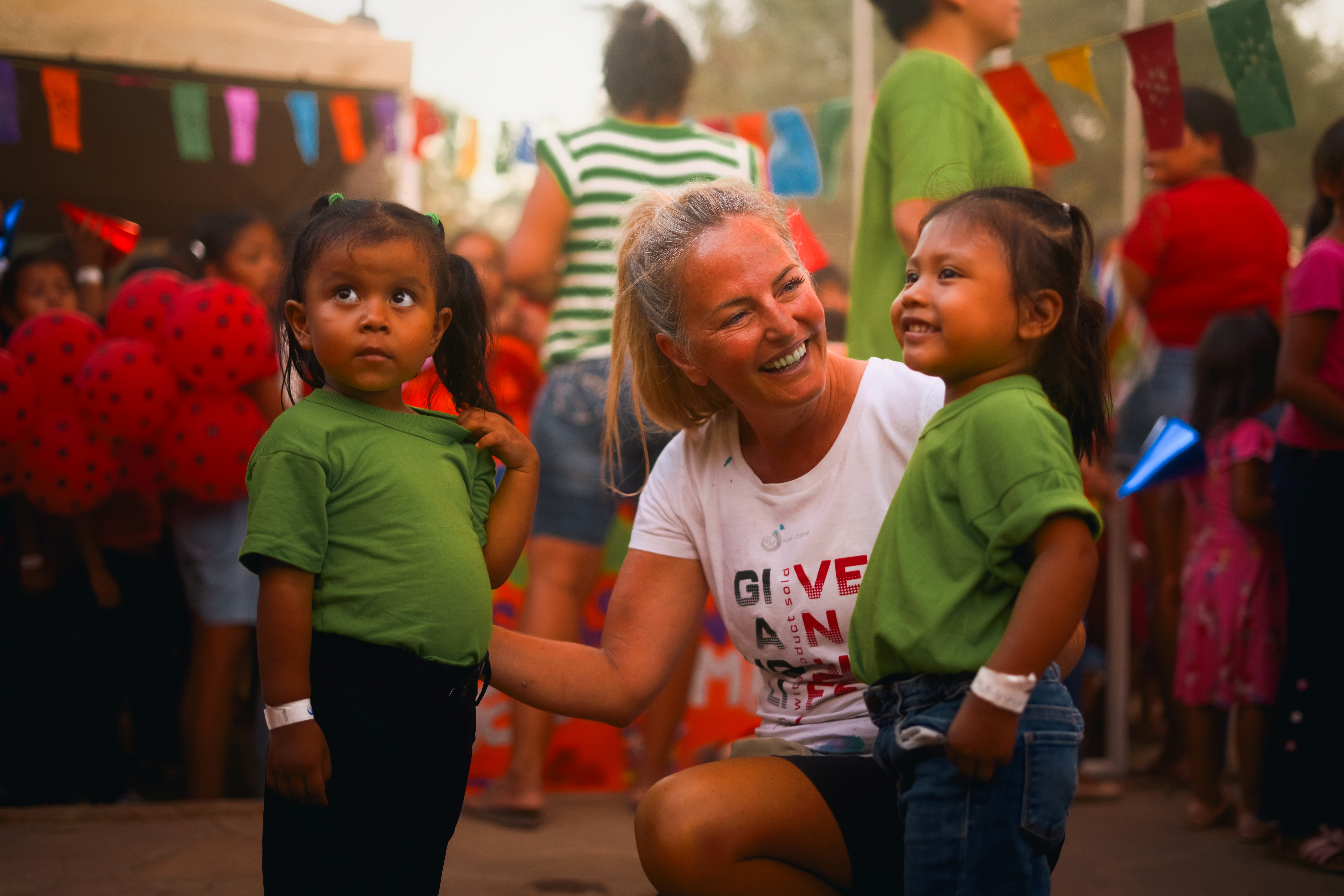 PM-International’s Charity Ambassador, Vicki Sorg (middle), meeting sponsored children in Bolivia